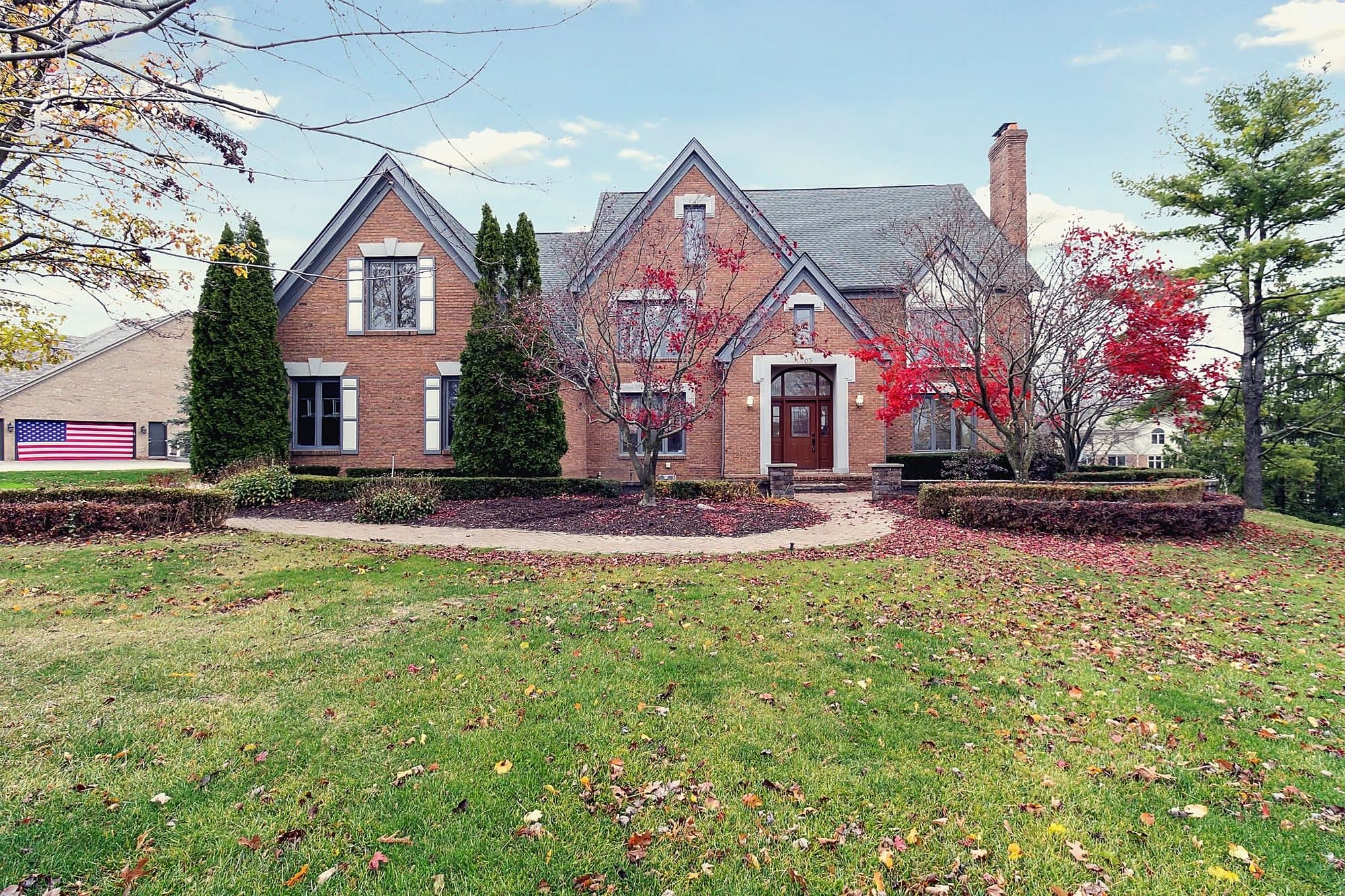 Established brick home with mature landscaping in Southeast Michigan